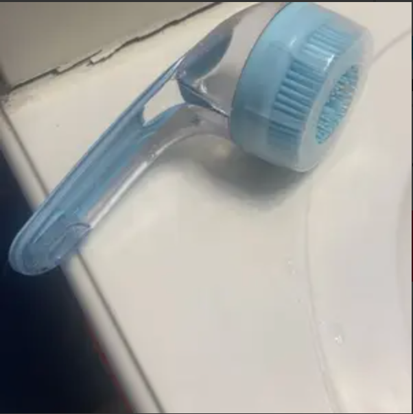 Customer's blue PawSuds brush