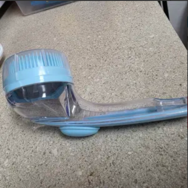 Customer's blue PawSuds brush on the counter