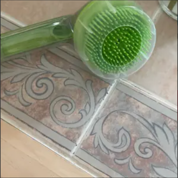 Customer's green PawSuds brush